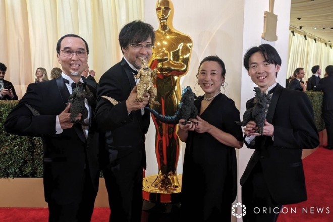 The "Godzilla-1.0" team on the red carpet at the 96th Academy Awards ceremony