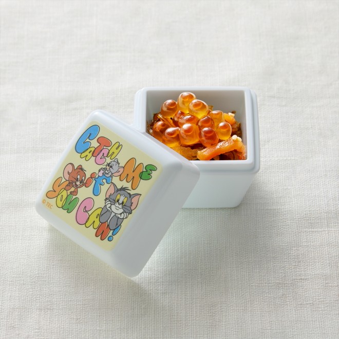 2026 two-tier Tom and Jerry Osechi set featuring traditional New Year dishes and cheese-inspired items.